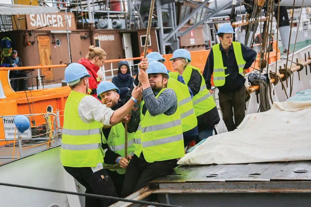 Unloading bags of coffee at port.