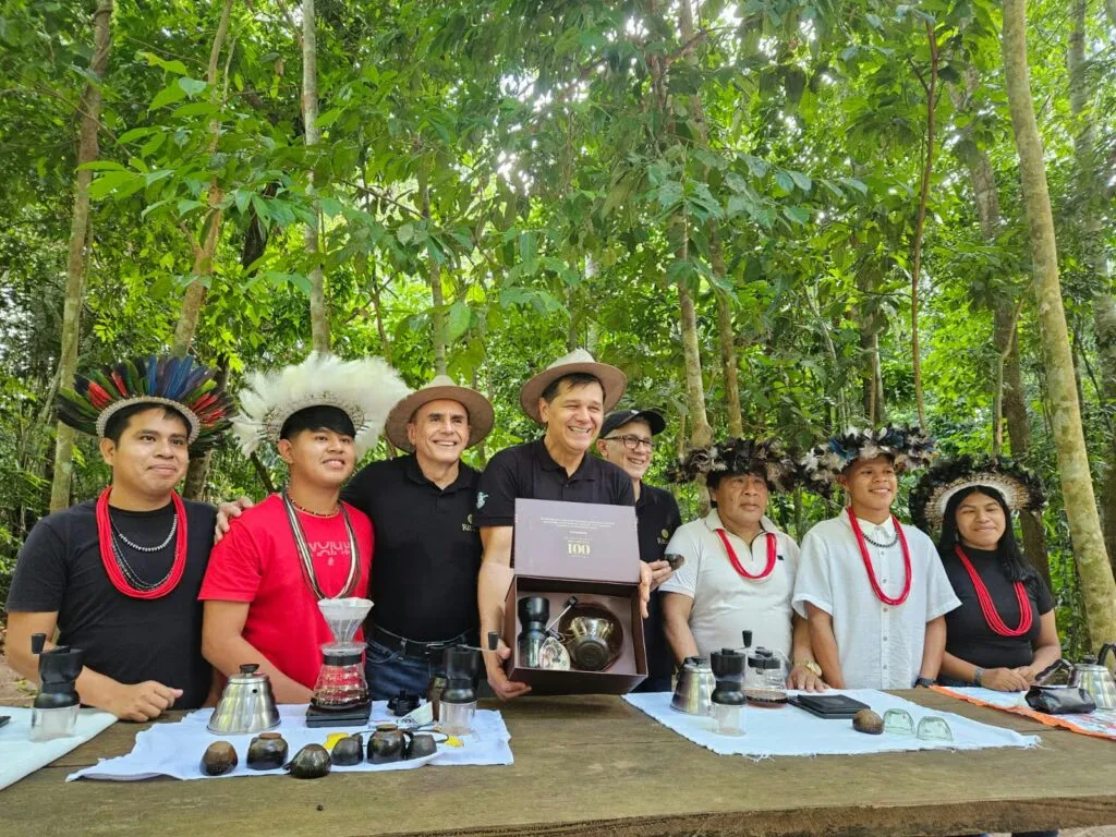 Cacique Rafael Mupimoku Suruí (third from left) during the 2025 harvest season in Rondônia. He and his family made history when their Amazonian robusta became the first canephora coffee to receive a perfect 100-point score from a specialty robusta grader jury.