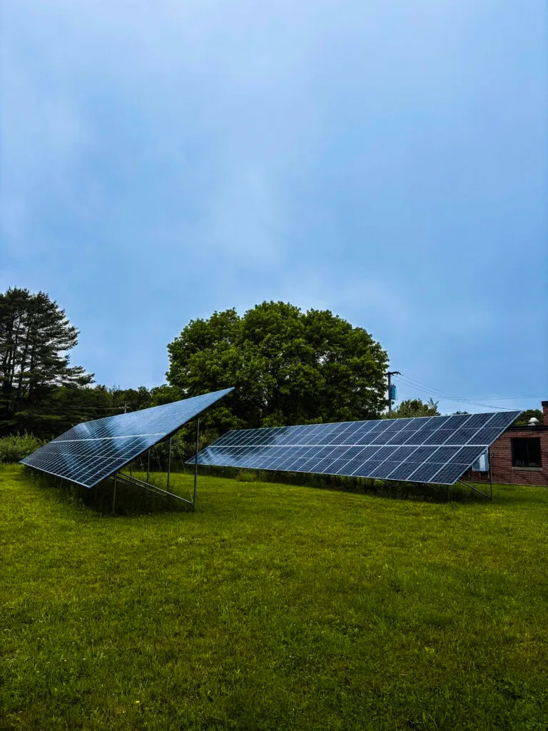 Wicked Joe harnesses solar power with a panel on their building (left) and a solar array (right).